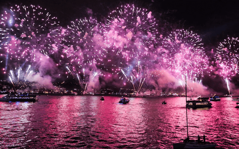 Spectacular fireworks over the Bosphorus Bridge during New Year’s Eve cruise in Istanbul