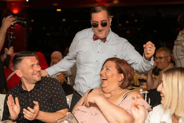 Tourists having fun and enjoying Turkish night show in Istanbul